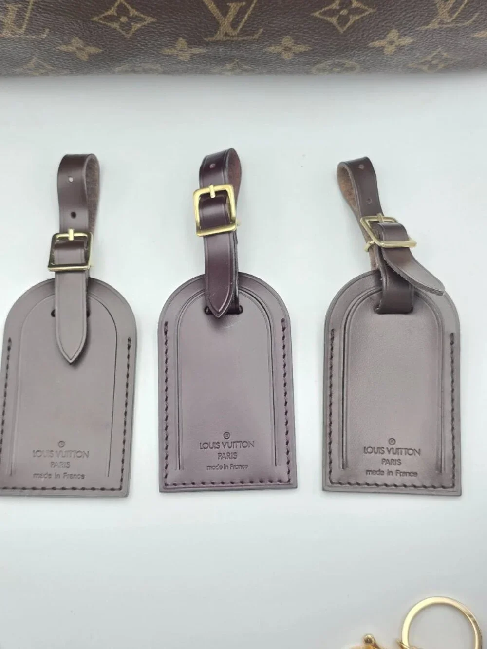 Authentic 1 Louis Vuitton Brown Leather Luggage Tag – Excellent Condition